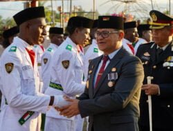 Pj Bupati Mappi Kukuhkan Paskibra dan Pimpin Upacara Taptu