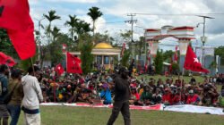 Bawa Salib Merah, KNPB di Timika Serukan “Papua Darurat Militer dan Kemanusiaan”